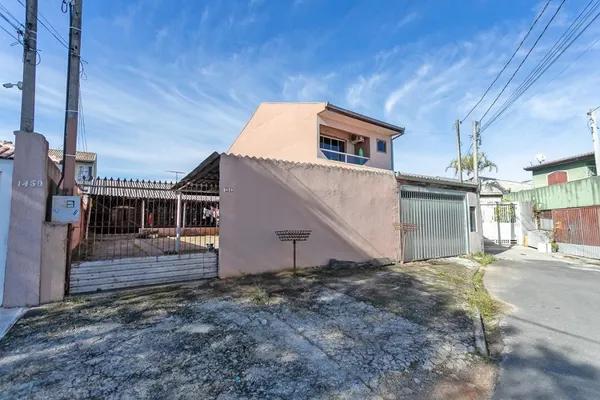 Terreno com Duas Construções – Excelente Oportunidade no Fazendinha